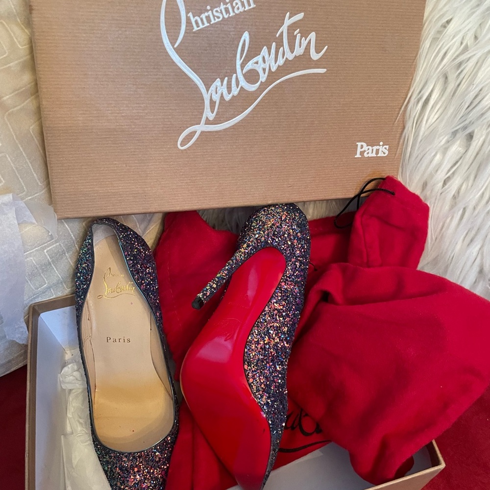 This is multi color Christian Louboutin size 8 US